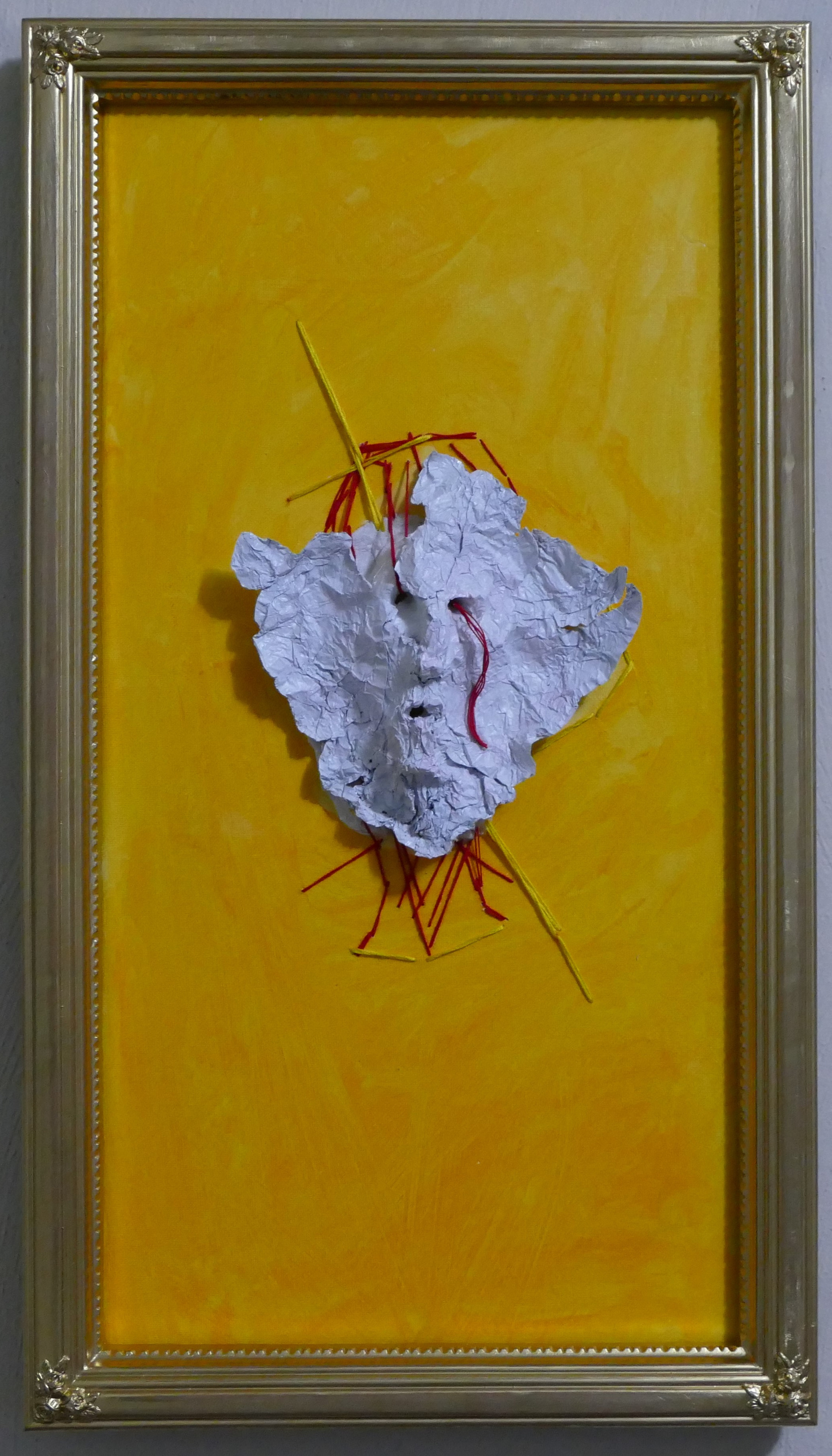 What happens when empathy cracks under the weight of time? This work reflects the strain of compassion during the ongoing war in Ukraine. A papier-mâché mask, vibrant yet fragile, symbolizes fading resilience. It asks: how long can we endure suffering befo